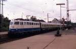 110 506-3 pulls an intercity train with coaches of former East German state railway (Deutsche Reichsbahn). Rheine (Westfalen) 04-08-1992.