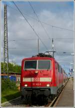 111 142-6 with bilevel cars pictured in Norddeich on May 13th, 2012