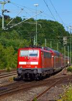 The 111 129-3 with the RE 9 (rsx - Rhein-Sieg-Express)  Siegen - Kln - Aachen, here at 08.07.2013 in Betzdorf/Sieg.
