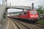 On 1 June 2012 DB Regio 111 127 pushes a regional train to Mainz Hbf out of Bingen (Rheinland).