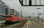 The DB 143 106 with an RE to Tbingen is leaving Stuttgart Hbf.