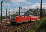 143 168-3 of the DB pushes RB 27 (Rhein-Erft railway), on 07.08.2011 in Cologne to the Hohenzollern Bridge in the direction of Koblenz Hbf.