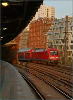 The DB 182 008 with a RE from Wismar to Cotbus by the S-Bahn Station Berlin  Hackscher Markt. 
17. 09.2012