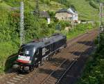 . MRCE ES 64 U2-098 (182 598-3) is running alone through Kattenes on the Mosel track on June 22nd, 2014.