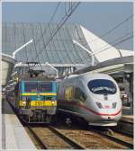 . HLE 2121 pictured together with a ICE in Lige Guillemins on March 30th, 2009.