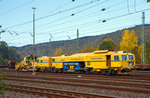   STRABAG  Tauberexxpress  a Plasser & Theurer Track Tamping Machine CSM 09 – 3X (PL), standing on 23.10.2016 in Betzdorf/Sieg (Germany).