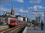 . A train of the Hamburger Hochbahn is arriving at the stop Landungsbrcken on September 17th, 2013.