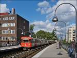 . A train of the Hamburger Hochbahn is arriving at the stop Mundsburg on September 17th, 2013.