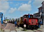 . A train headed by the locomotive  Aurich  of the Borkumer Kleinbahn pictured in Borkum on May 12th, 2012.