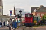 . The Schma Diesel engine  Berlin  is hauling its heritage cars out of the station of Borkum (Nordseebad) on October 8th, 2014.