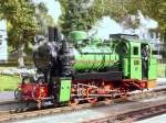Mh Steam Locomotive 53 ,( 99 4633-6 ) in green livery , is on the island of Rgen in use.