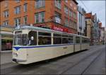 The heritage tram N 178 is running on a sightseeing tour through Bahnhofstrae in Erfurt on December 26th, 2012.
