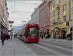 Innsbruck Tram 308 is running through the Museumsstra�e at Innsbruck on December 22nd, 2009.