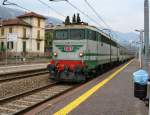 The E 646 158 with a local train to Milano is entering in the Stresa Station.