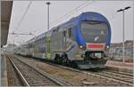 A FS Trenitalia ALe 506  Treno 72  is waiting in Chivasso his next service. 

24.02.2023