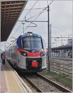 The FS Trenitalia TPER ETR 103 015 in Reggio Emilia on the way to Guastalla. 

14.03.20235