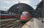 The FS Trenitalia ETR 400 033 is leaving Milano Centrale.