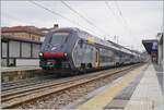 The Treniatlia TPER ETR 521 025  ROCK  is the regionale 3917 from Piazenca to Ancona. This train makes a stop in Reggio Emilia.

14.03.2023