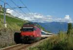 Lavaux Re 460 042-5 with a special IR Vevey - Luzern in the vineyard by Chexbres. 
05.9.2009