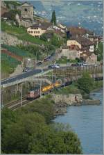 Lavaux The Re 4/4 II 11266 and an other one with a Cargo train by St-Saphorin. 
02.08.2011