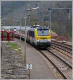The IR 112 Luxembourg City - Liers is running throught the station of Goebelsmhle on April 14th, 2012.
