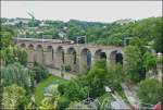 . The IR 115 Liers - Luxembourg City is running on the Pulvermhle viaduct in Luxembourg City on June 14th, 2013.