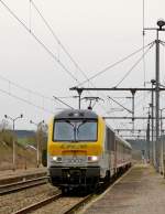 . 3002  Blankenberge  is hauling the IR 112 Luxembourg City - Liers into the station of Gouvy on April 4th, 2014.
