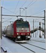 4017 with RB 3238 Wiltz - Luxembourg City is entering into the stationof Ettelbrck on December 25th, 2010.
