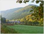 . The RB 3235 Wiltz - Luxembourg City is crossing the Sre Bridge in Michelau on October 19th, 2013.