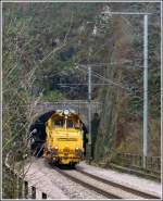 . CFL 791 (Plasser & Theurer Ballast Distributing and Profiling Machine NSP 2010 SWS N 99829225791-7) is entering into the tunnel Fischterhaff near Goebelsmhle on November 16th, 2011.