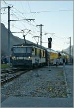 mob-montreux-berner-oberland-bahn The colour variation: MOB GDe 4/4 with a Golden Pass Panoramic is arriving at Saanen. 
05.11.2010