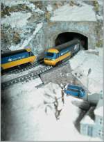 To BR HST 125 meets in the Snow Landscape on my T Gauge Model Railroad.