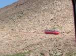 Mount Washington A single car labors up the hill toward Pikes Peak, Colorado. 8 June 2003.