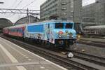 RailExperts RXP have given their electric 9902 a new paint job, based on a children's  booklet 'Tommy and Tess take the train' and gets photographed at Amsterdam Centraal on 6 January 2024.
