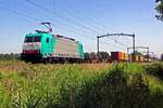 RTB 186 207 hauls a poorly loaded intermodal train through Oisterwijk on 28 June 2019