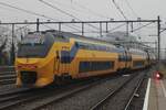 NS 9557 quits Nijmegen on a grey 16 December 2023 as IC-service to Alkmaar via Arnhem and Utrecht.