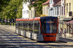 Bergen Light Rail Tram 219 at Byparken. The trams are 32.180 m long and 2.65 meters wide, weighing 35.7 tonnes. They have five articulated sections, and are expandable with another two modules to a length of 42 meters, should higher capacity be necessary. 
Date: 10 July 2018.