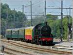 PFT-TSP The PFT-TSP P8 steam locomotve 64.169 is hauling its historical train into the station of Ciney on August 16th, 2009.