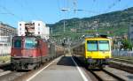 re-420-re-4-4-ii Re 4/4 II and train des Vignes (vineyard train) in Vevey.
16.07.2007   