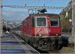 re-420-re-4-4-ii Re 4/4 II 11302 is arriving at the station of Sargans on December 22nd, 2009.