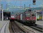 re-420-re-4-4-ii Re 4/4 II 11289 is hauling a freight train through the station of Spiez on July 28th, 2008.