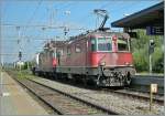 re-420-re-4-4-ii Two Re 4/4 II and one wagon in St.Margrethen. 
28.07.2008