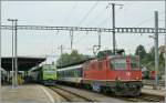 re-420-re-4-4-ii Re 4/4 II with a local train to Yverdon and a NINA to Murten wait in Payerne the departure time. 
06.09.2010