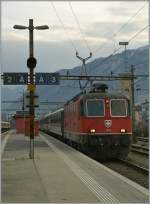 re-420-re-4-4-ii On the place of a SBB Re 460 is this Re 4/4 II 11205 with the IR 1712 from Brig to Geneva airport by the stop in Sion.
14.02.2011