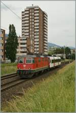 re-420-re-4-4-ii SBB Re 4/4 II 11211 with an Domino ABt by Grenchen.
07.06.2011