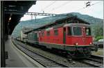 re-420-re-4-4-ii A reed and a green Re 4/4 II in Vevey. 
31.05.2011