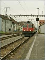 re-420-re-4-4-ii Re 4/4 II 11204 is arriving with his local train to Romont at Payerne. 
06.09.2010