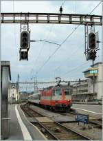 re-420-re-4-4-ii Re 4/4 II 11109 leaves with his RE Lausanne to Geneva.
06.07.2011