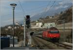 Re 460 SBB Re 460 026-8 wiht an IR is arriving at Leuk. 
06.02.2012