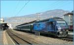 Re 460 SBB Re 460 051-6 with an IR to Brig by the stop in Vevey. 
09.03.2011
